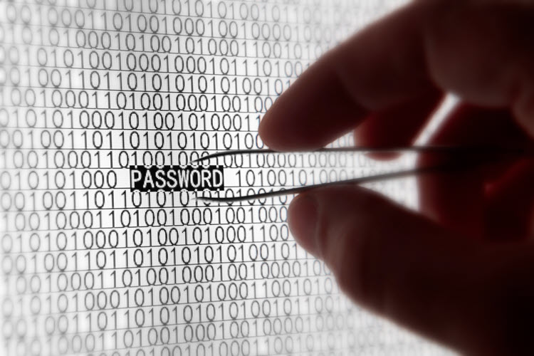 BlackCloak someone using tweezers to extract a password