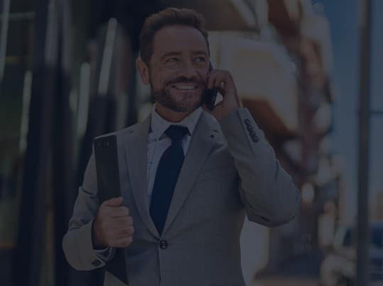 A business executive using his personal device