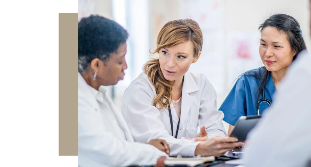 Doctors discussing cyber risk